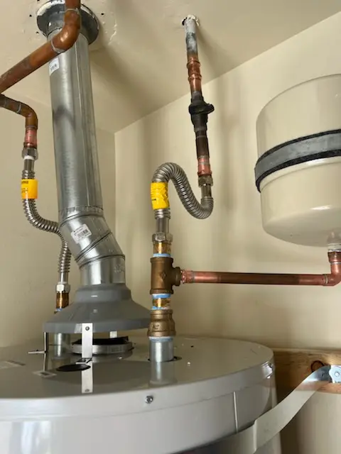 Water heater installation and plumbing repair in Medlock Park